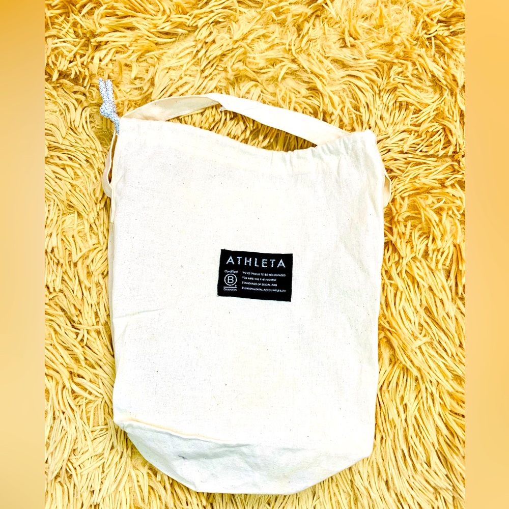 Athleta beige fabric Tote Bag with drawstring closure